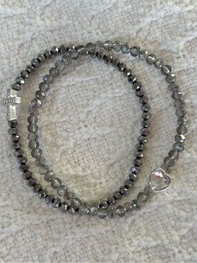 Pair of Beaded stretch bracelets in gift box heart and cross